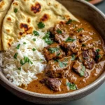Creamy Coconut Curry Beef with Rice and Garlic Naan